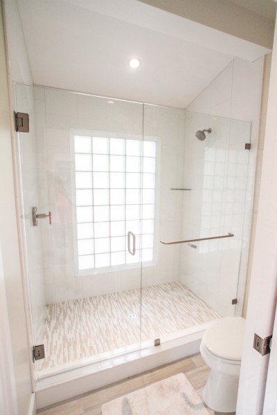 Custom Shower: Italian wall tile, Spanish floor tile and a retro/vintage class block window...Coolest bathroom in town!